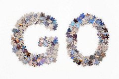 The word Go made from jigsaw puzzle pieces